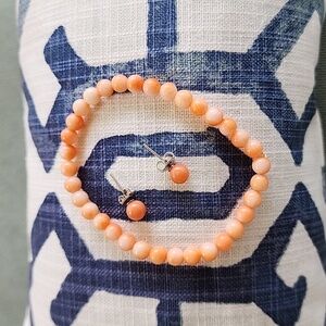 Natural Salmon peach and cream coral bracelet and stud earrings.